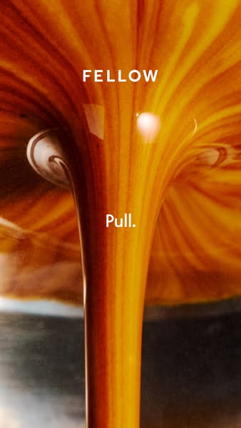 This ad image features a close-up shot of coffee being poured, with the brand name 'Fellow' appearing above. It 