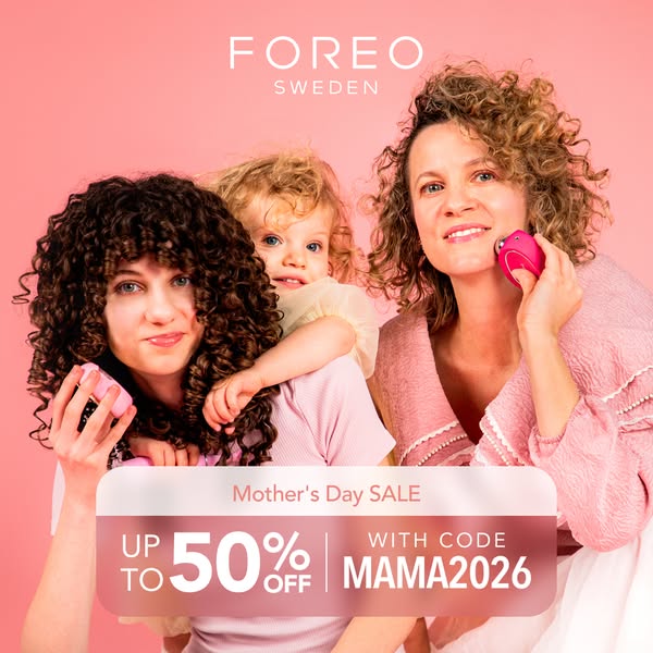This ad from Foreo, promoting a Mother's Day sale of up to 50% off, features three women of varying ages on a pink b