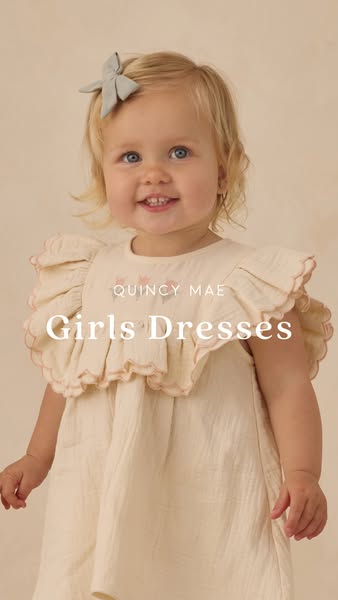 This ad promotes Quincy Mae's girls dresses and features a young girl wearing one of the brand's dresses. The ad