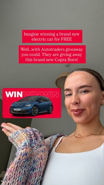 This ad features a woman advertising a giveaway for a brand new electric car from Autotraders. The overall focus is on t