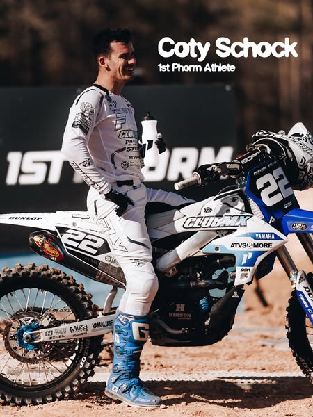 This image ad features motocross athlete Coty Schock promoting 1st Phorm products. The visual focuses on Schock standing