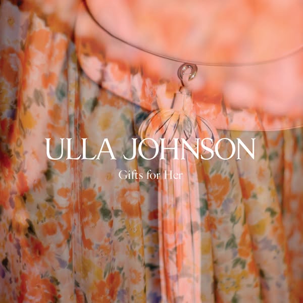 This Ulla Johnson ad features a close-up shot of an orange floral dress with the brand name and 'Gifts for Her'