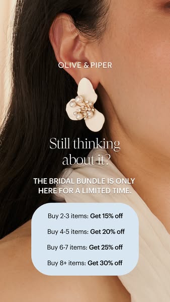 An ad by Olive & Piper for their Bridal Bundle. It features a close-up of a woman wearing a flower-shaped earring. T