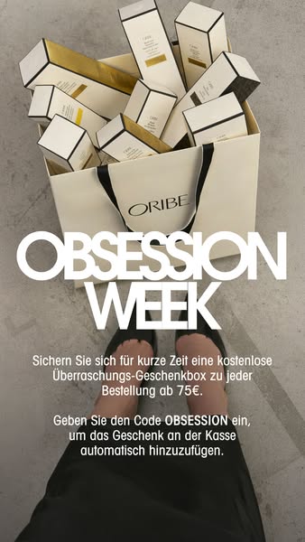 This ad showcases Oribe products inside of a shopping bag. The ad is advertising a free surprise gift box with orders ov