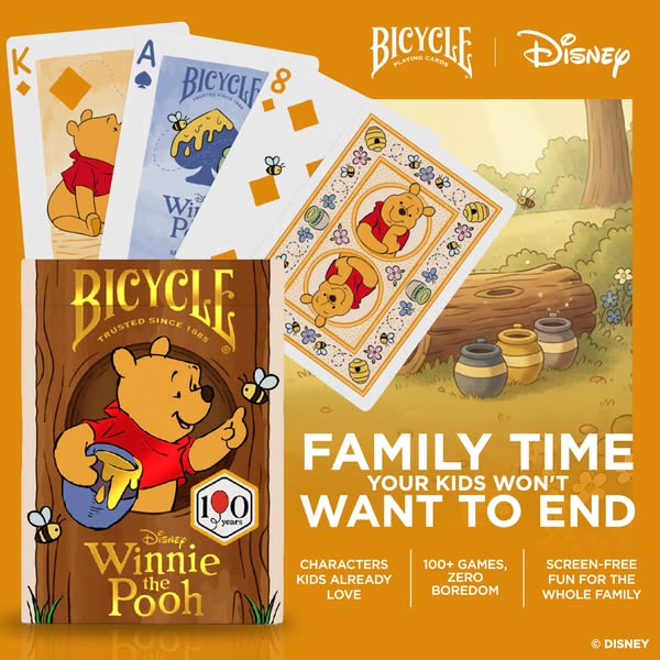 This image ad promotes Bicycle brand playing cards featuring Disney's Winnie the Pooh. It emphasizes family fun, scr