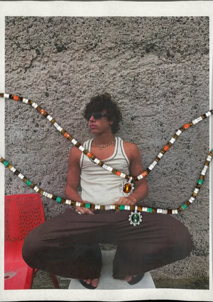 The image ad showcases beaded necklaces with gemstone pendants being worn by a person in a lifestyle setting. The ad is 