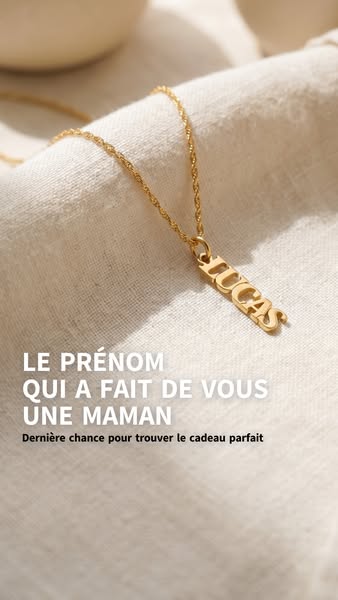 An image ad displays a gold nameplate necklace on a light-colored fabric surface. The ad emphasizes the emotional connec