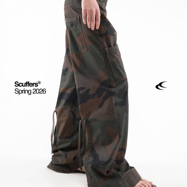 This ad features camouflage pants and promotes Scuffers Spring 2026 line.