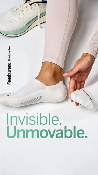 This ad promotes Feetures socks, specifically highlighting that they are invisible and immovable. The image shows a pers