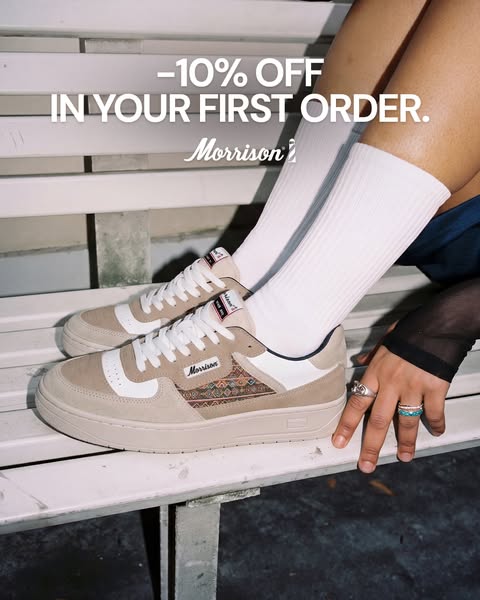 This ad for Morrison sneakers features a close up shot of the sneakers on a bench, along with a promotion for 10% off th