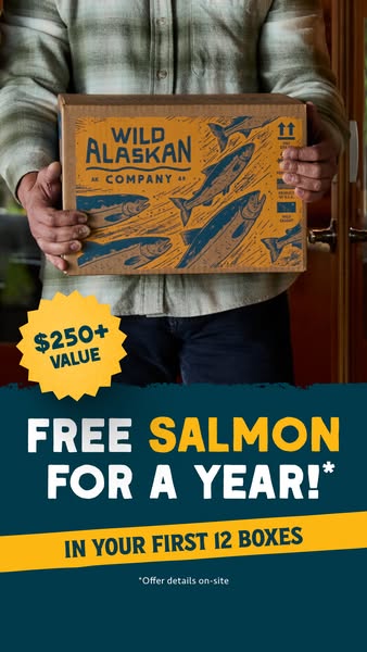 The ad features a person holding a box of Wild Alaskan Company salmon with a promotional offer of "Free Salmon For 