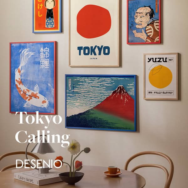 This image ad for Desenio presents a gallery wall featuring several framed art prints in a warm, inviting dining room se