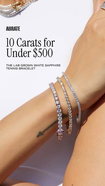 This is an image ad that showcases a woman's arm and wrist wearing three AURATE lab-grown white sapphire tennis brac