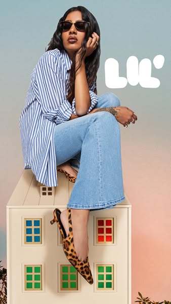 This ad features a person sitting on a dollhouse wearing the brand's shoes.