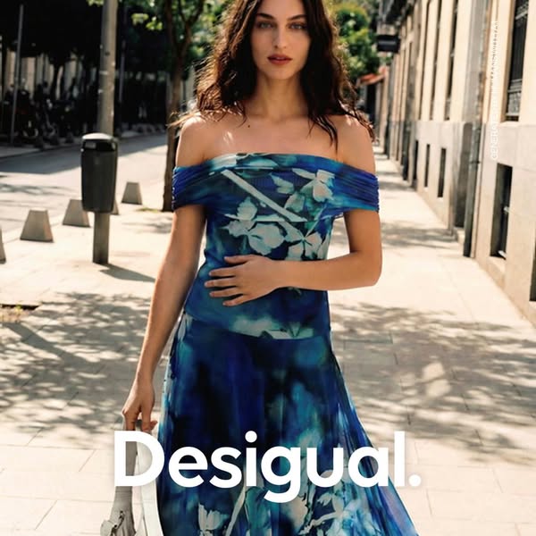 This ad features a model in a Desigual dress. The ad aims to showcase the brand's aesthetic through an aspirational 