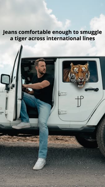 This ad uses humor to illustrate the comfort of the advertised jeans. A man is seen exiting his vehicle while a tiger is