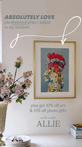 This ad features a photo of a Minted art print hanging in a user's kitchen. The ad encourages viewers to shop at Min