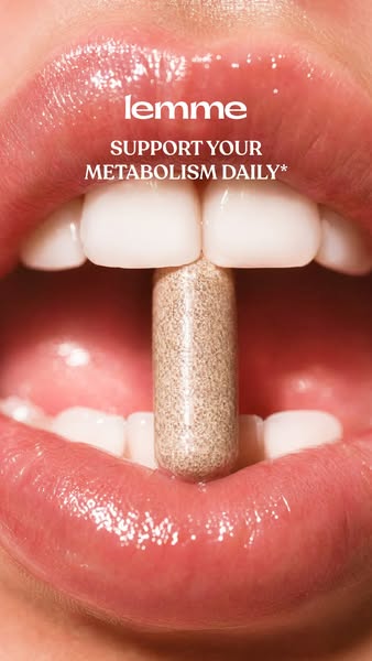 This ad features a close-up of a person's mouth with the brand's supplement pill positioned between their teeth.