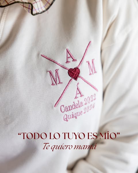 This image ad features a close-up shot of a personalized sweatshirt, embroidered with the word 'MAMA' surroundin