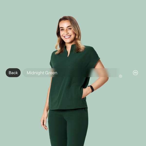 This ad features a woman wearing a FIGS brand scrub set in 'Midnight Green'. It showcases the color and fit of t