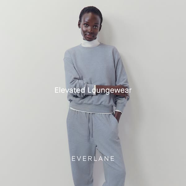 The ad features a model wearing Everlane loungewear in a neutral-toned setting. The focus is on the elevated comfort and
