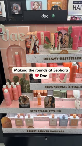 This ad showcases the Dae hair care line on display at Sephora, highlighting its branding, product range, and positionin
