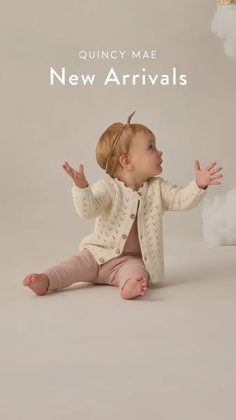 This ad showcases Quincy Mae's new arrivals with an image of a baby wearing the brand's clothing. The ad is simp