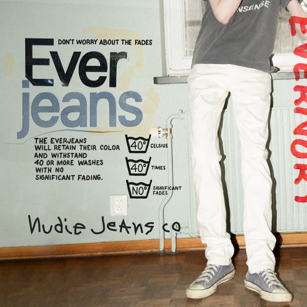 This ad promotes Ever Jeans, highlighting their color retention even after multiple washes, presented in a raw, edgy sty