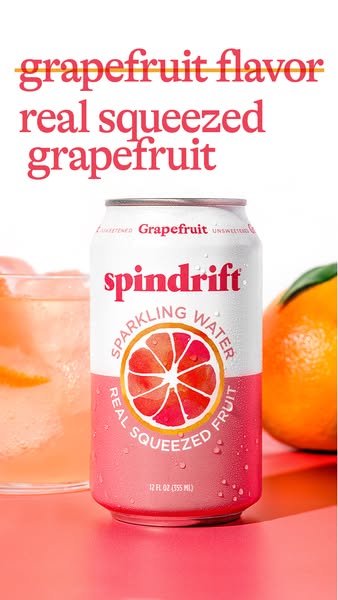 This ad features a can of Spindrift grapefruit flavored sparkling water alongside a glass of the beverage and a fresh gr