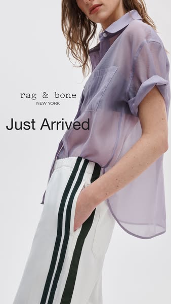 This image ad promotes Rag & Bone clothing, specifically a lilac sheer button-up shirt and white pants with two blac