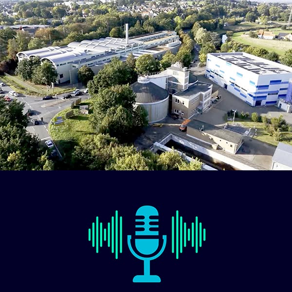 This image ad uses an aerial shot of a factory to represent the scope of the brand, combined with a microphone and sound
