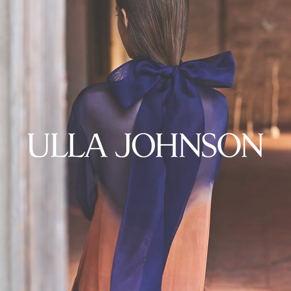 This image ad features the Ulla Johnson brand with a focus on a specific dress. The shot is from behind a woman wearing