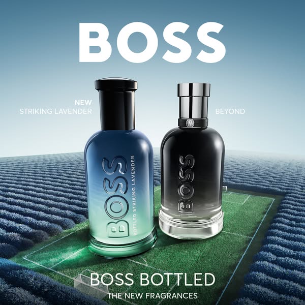 An advertisement for BOSS Bottled fragrances. The image features two variations of the fragrance placed on a simulated l
