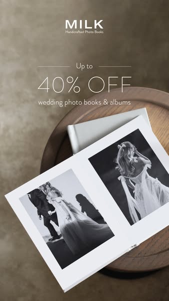 Image ad promoting MILK Handcrafted Photo Books & Albums with an offer of up to 40% off. The ad showcases an open ph