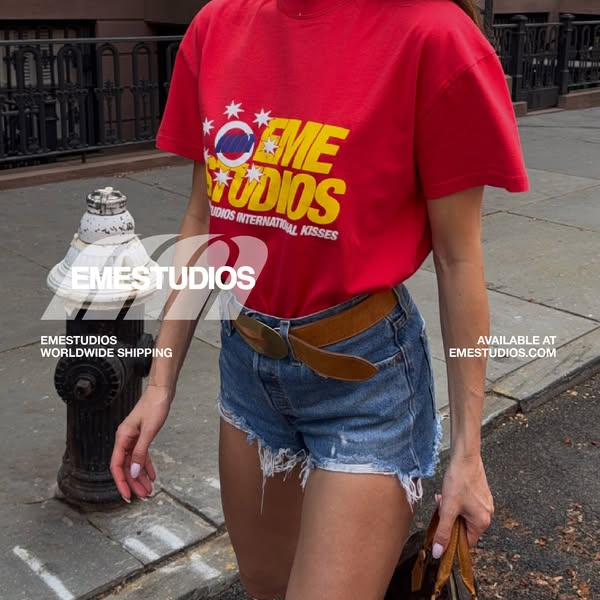 This ad features a model wearing a red t-shirt from EME Studios with the brand logo and name across the front. The t-shi