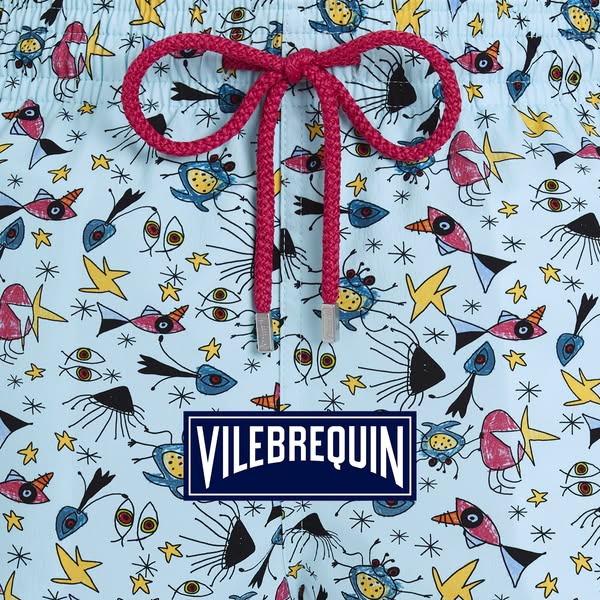 This ad features a close-up of Vilebrequin swim trunks with an all-over print, with a focus on the brand logo.