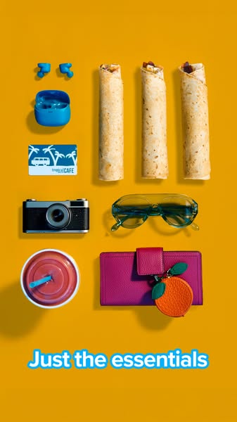 This flatlay-style ad from Tropical Cafe showcases three of their wraps along with a collection of the essentials someon
