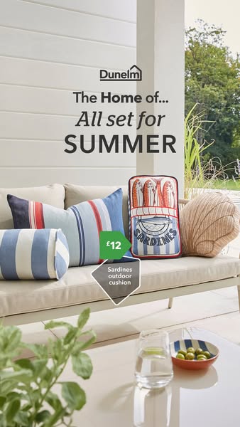 This ad by Dunelm features a living space styled for summer, highlighting several decorative pillows that are available 