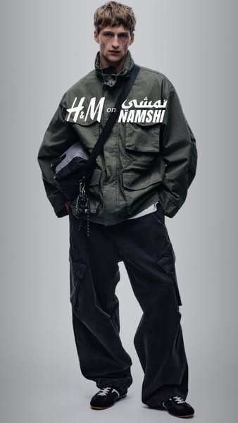 This H&M ad features a person modeling an outfit, focusing on highlighting the clothing and accessories available th