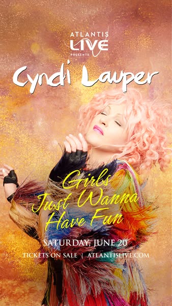This image ad promotes an upcoming concert by Cyndi Lauper. It features an image of the artist in concert, along with ke