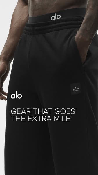 This Alo image ad features a close-up of a person wearing black Alo sweatpants. The ad highlights the brand's commit