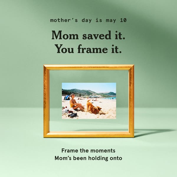 The ad is advertising a framing service. The ad displays a photo in a frame and prompts the viewer to 'frame the mom