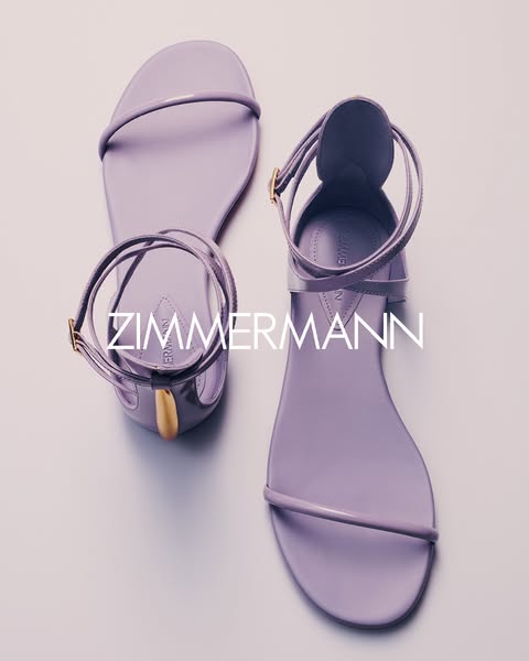 An image showing a pair of lilac Zimmermann heeled sandals against a pale background, focusing on the brand's visual