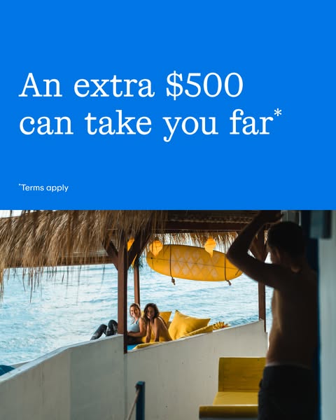 This ad shows an idyllic island scene to sell the idea that an extra $500 can take you far.