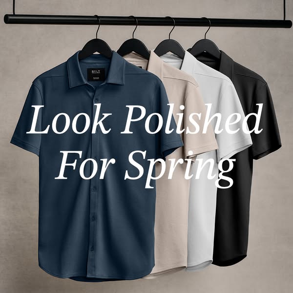 An image ad for BYLT showcasing a variety of different colored short sleeve shirts.