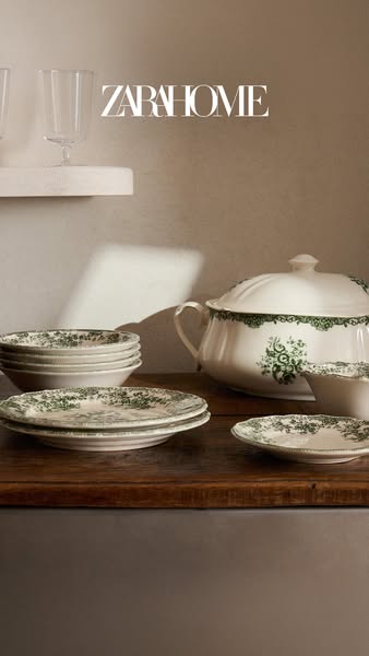 This ad showcases Zara Home's vintage-style floral dinnerware collection. The image features a rustic, inviting tabl