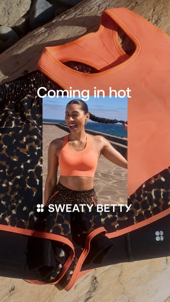 This ad showcases a woman in Sweaty Betty activewear, with the products laid out in the background and foreground, to cr