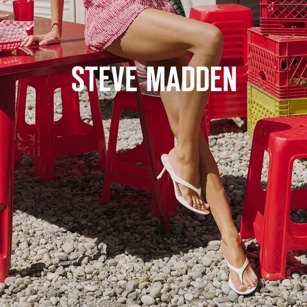 This Steve Madden ad showcases a pair of white heeled flip-flops, designed to grab attention with its bright color schem