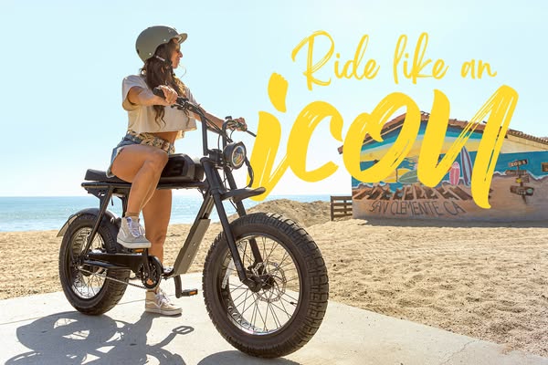A woman rides an electric motorbike on a beachside road. The ad encourages viewers to 'Ride like an icon'.
