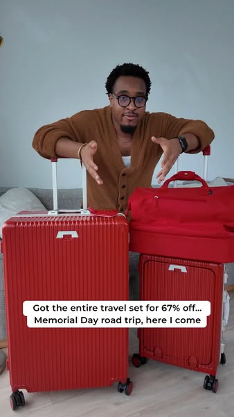 A man showcases a luggage set and promotes a Memorial Day sale.